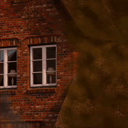 Nahaufnahme einer roten Backsteinfassade mit weiß gerahmten Fenstern und herbstlich gefärbtem Laub